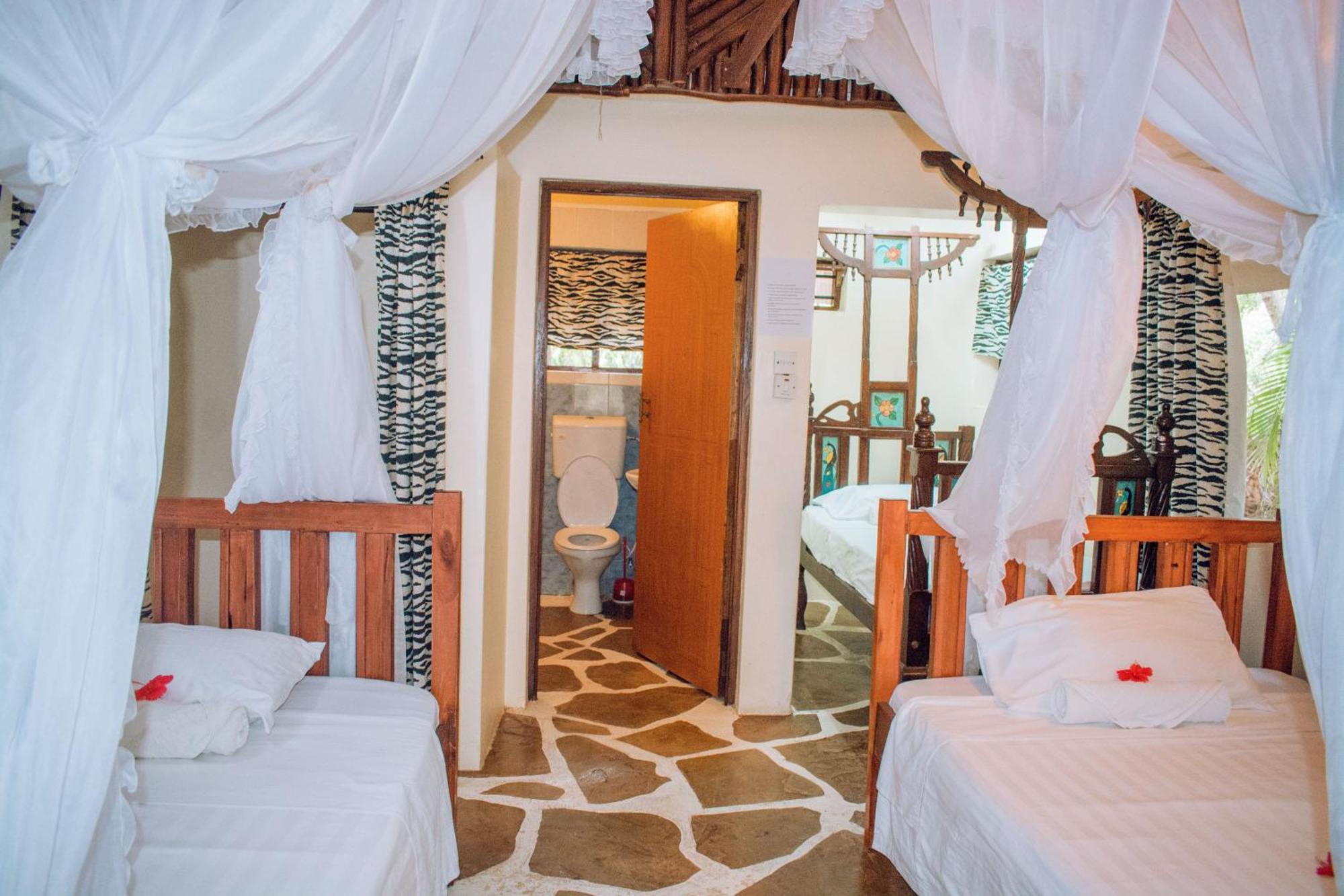 Kijani Cottages In Diani Diani Beach Esterno foto