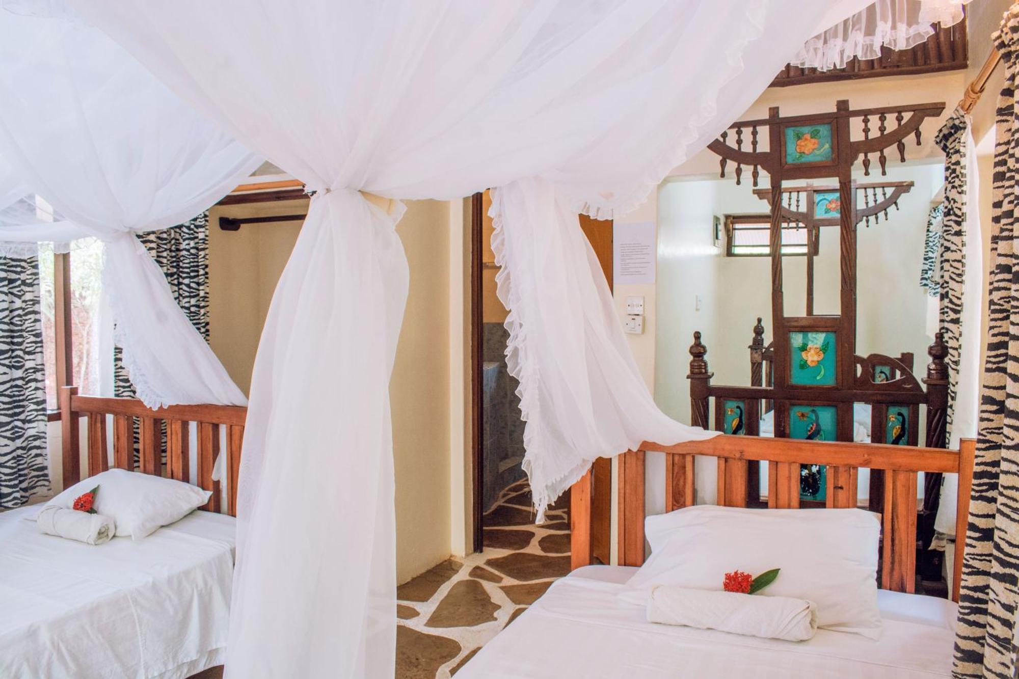 Kijani Cottages In Diani Diani Beach Esterno foto