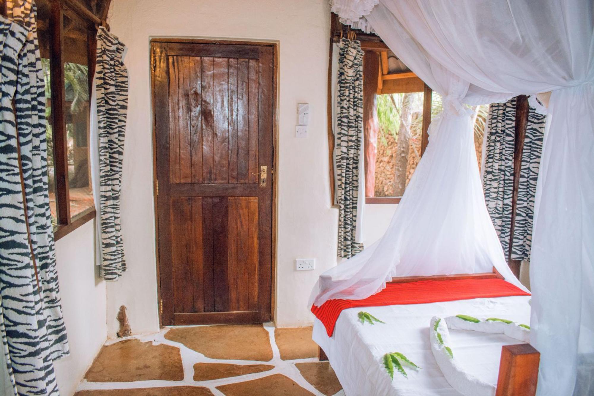 Kijani Cottages In Diani Diani Beach Esterno foto